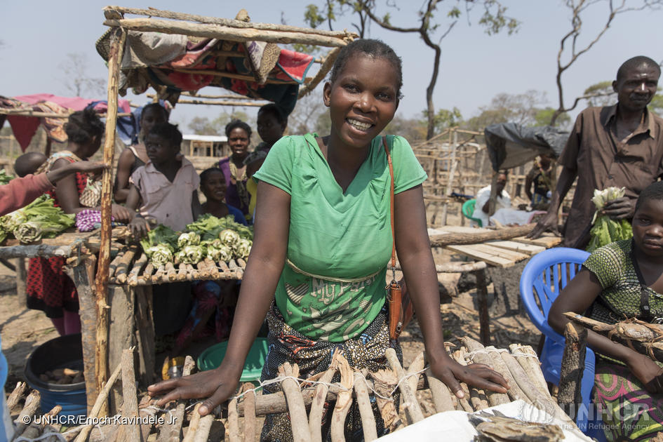Bwalya, 28, is a Zambian trader from the nearby village of Kampampi who regularly comes to Mantapala Settlement to sell fish she buys from traders along the road to Nchelenge. She is saving up the money she makes for her education. 