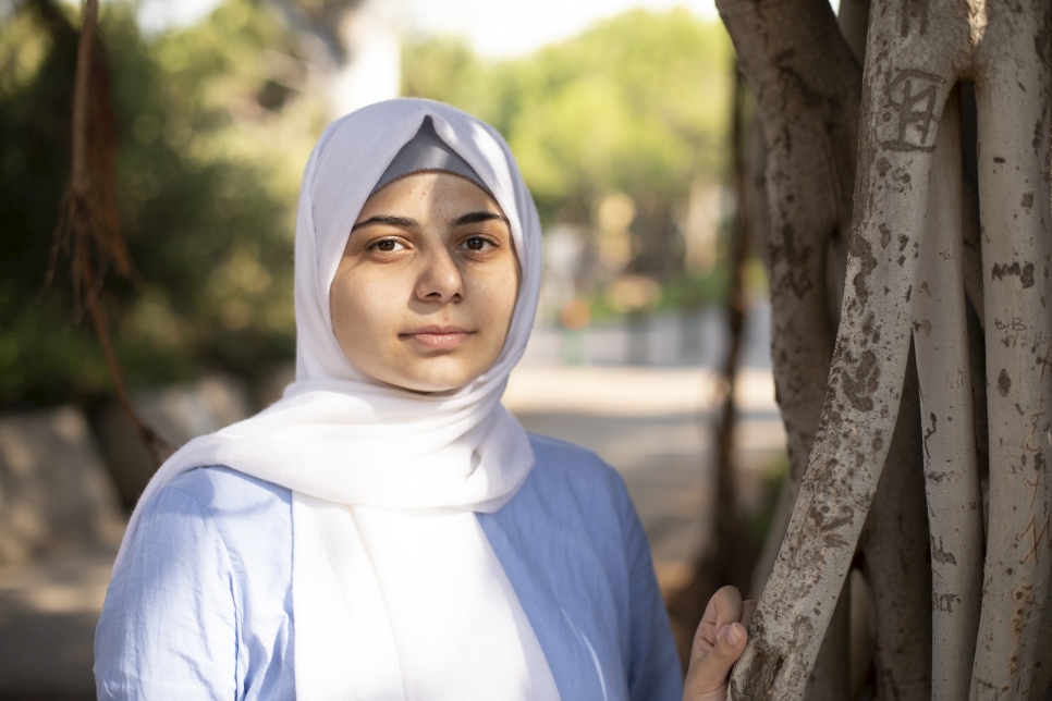 Fatima, 21 years old; DAFI alumnus; master's student in Astrophysics at American University of Beirut (AUB), as graduate assistant; from Idlib, Syria; in Lebanon since 2012; interviewed on 08 October 2018 on AUB Campus in Beirut.

"I was in 8th grade when the war started in Syria. One day when I was heading to the basement, a missile stroke a green field next to my home and I fell. The next day, I received news that my best friend's house was struck by a missile and that she had passed away. Later on, my school turned into a military base and the only operating school nearby was 30 minutes away by foot. I would run to the school under open fire, in order to ask about certain things that I didn't understand. With all the chaos, I sat for my official exams and passed grade 9. 

As the situation started getting worse in Aleppo, we had to move to Lebanon in October 2012. I was a month late to registration but I made it into 10th grade with no English or sciences background. In Lebanon, the educational system is completely different from the Syrian one. In Syria, everything is in Arabic, whereas here, it is in English. It was hard, at the beginning, to adjust, but I managed. My classmates and even teachers made fun of me for not understanding English. This pushed me to learn through YouTube and eventually, I could understand sciences as well. My average jumped from 10/20 in Grade 10 to 17/20 in Grade 11. During my final year, our maths teacher left the school and his replacement was not good, so I had terrible grades in this subject, which accounted from one third of the total average. So I only got 50% but, in the end, I passed. 

After I passed grade 12 in Lebanon, I started searching for higher education scholarships and discovered the DAFI scholarship. I applied with no hopes of getting accepted but, thankfully, I did. I started my bachelor's degree in Physics a the Lebanese University. The first year was terrible as I didn't understand anything. Because of the war in Syria, I did not attend many of the classes, even though I passed. So I had no idea about physics or chemistry. With my weak background in these subjects, it was a big challenge to catch up when I enrolled at university. I used to read reference books, to study harder than my peers in order to succeed. Three years later, I finally graduated with a good mention and never repeated a class twice. 

I was very anxious about my future when I was still an undergrad. I did not have any chance to continue my studies at the Lebanese University, so I had to find other ways. I applied to AUB, with a good GPA, but they rejected my application at first. However, two days before the start of the school year, they called me to tell me that I was accepted! It was a very beautiful surprise!

I am now pursuing my Master's here, in Astrophysics. I am very ambitious and one of my goals is to win the Nobel Prize in Physics one day, or to work for NASA! When I was a child, one of my dreams was to become an astronaut. I have always been interested in everything related to astrophysics. That is why I chose Physics as my major.

DAFI has given me the opportunity to push myself farther than I can imagine and overcome all the obstacles that were ahead me. My journey will not stop here. I will keep on pushing myself to help my community and myself in whichever way I can.

I believe in something: being a refugee does not mean that you cannot have dreams. You need to dream big in order to achieve big. The future is waiting for us. Eventually we will have to go back to Syria and to rebuild our country. So we have to face our fears and to navigate through them. Syria really needs us. There are many generations who are waiting for us there. We have to help them, to make the future beautiful for them. 

Albert Einstein was a refuge and he is one of history's greatest physicists. Ok, we are refugees. We have to face many problems, but we have to face them. We cannot give up. We have to be brave. That is the only way we can achieve our dreams. 

My life in Beirut is fine. I get along well with other students. The Lebanese society is different from the Syrian one but I love it. My best friends are Lebanese actually. 

I used to work as a private tutor. I was giving maths and physics lessons to middle-school students. I stopped when I joined the AUB because as a graduate assistant here, I have to work as a lab instructor, to mark copies, etc. 

Education, in my family, is very important, although my parents did not complete theirs. I have six siblings and we are all studying. Actually one of my brothers is also a student here at AUB, on a full scholarship! He studies Civil Engineering. My family has always supported me a lot. I have faced a lot of problems throughout my studies, I have been through very hard times, but they were always by my side, encouraging me. They tell me: "You are ambitious, you have to achieve your goals, you are strong". My best friends were also there for me all the time. 

My father calls me 'The Legend'! (laughs) He always tells me: "You did the impossible". When we came to Lebanon and I went to high-school here, it seemed impossible to pass the year. My English was horrible and I did not have any idea of the subjects... But I did it! When AUB accepted me, he cried a lot. He told me: "You are about to achieve your dreams; you are about to turn the impossible into reality"."