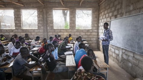 South Sudanese teacher Lim Bol teaches at a primary school in Kule refugee camp, Ethiopia, March 2016.