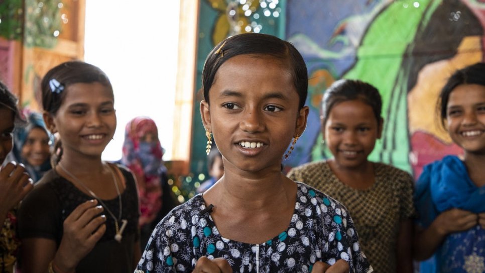Myshara, 13, a Rohingya refugee from Myanmar, leads a group of other children who are learning to talk about their worries as part of a mental health programme at Kutupalong camp in Bangladesh. 