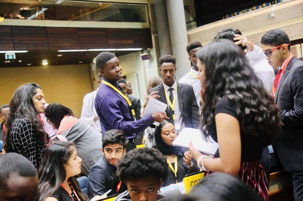 Students in Nairobi, Kenya, debate as part of the MUN Refugee Challenge