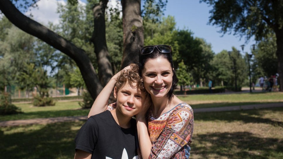 Valentyna Uvarova and her son Nazar are photographed in Natalka Park, Kyiv, during a birthday party for Pavlo Soroka, son of Tetiana Baransova.
