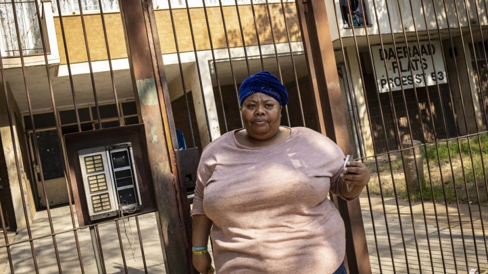 South African volunteer Désirée Booysen leaves her building in Pretoria to distribute food to people on the streets and in community centres.