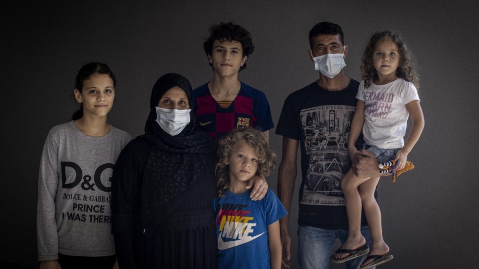 Manar (far right) poses for a family portrait with (from left to right), her sister Iman, 13, mother Fahima, 35, brothers Jamal, 15, and Mahmoud, 8, and father Mohammad, 39.
