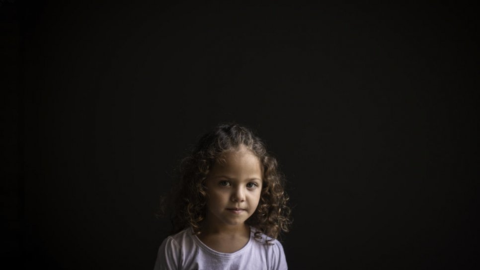 Four-year-old Syrian refugee Manar is photographed at her home in Beirut, Lebanon.