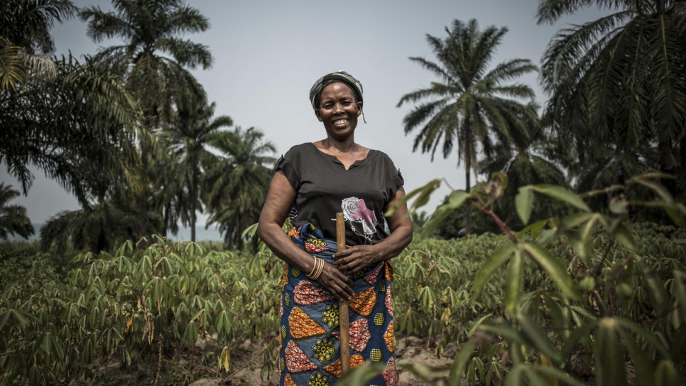 Ungwa Sangani, a 50-year-old internally displaced widow and mother of six, is photographed on farmland that is part of Evariste Mfaume's agricultural project in Lusenda.