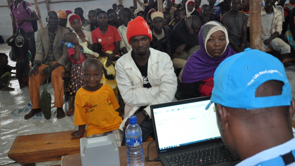 Havugiyaremye and his family register with UNHCR on arrival at Kinazi transit center, Burundi, after returning from Mtendeli refugee camp in Tanzania.