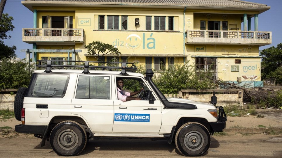 Luis Jose Faife sits in his UNHCR vehicle in Beira, Mozambique.