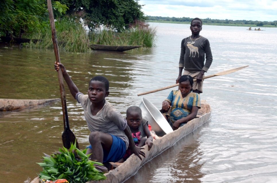 Blandine, 22, a refugee, returns to Toko Kota village in the Central African Republic after travelling to her hometown of Buda in the Democratic Republic of Congo with her younger brothers in look for food. She is nine months pregnant but has not had a pre-natal examination because Toko Kota lacks a clinic.
