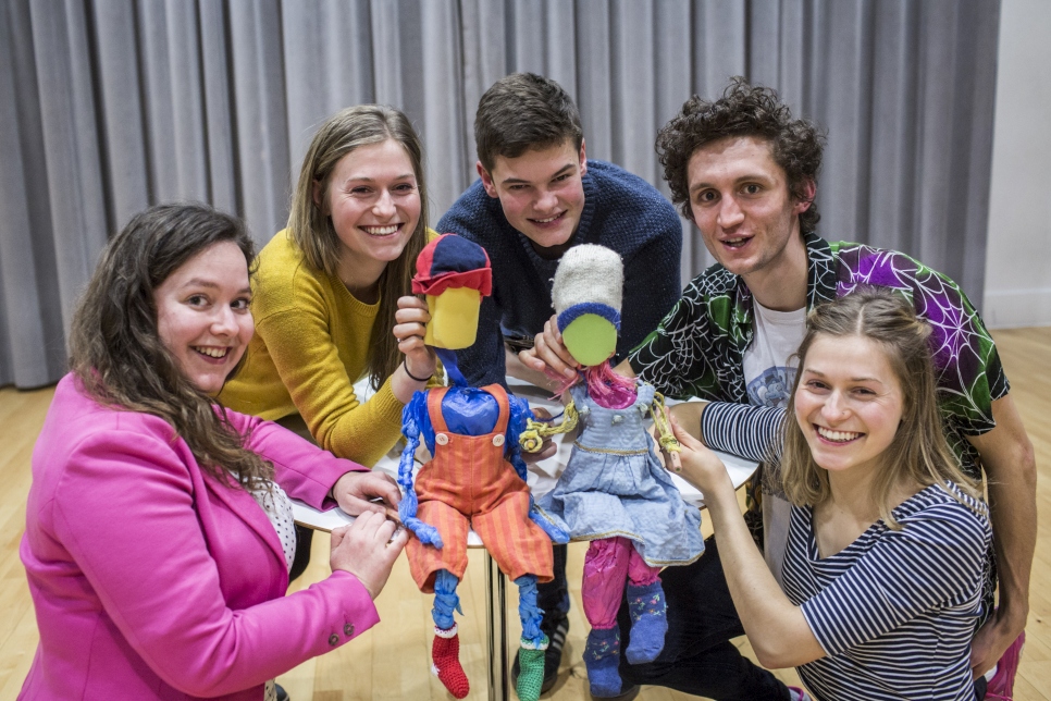 A theatre group made up of young volunteers rehearse in London