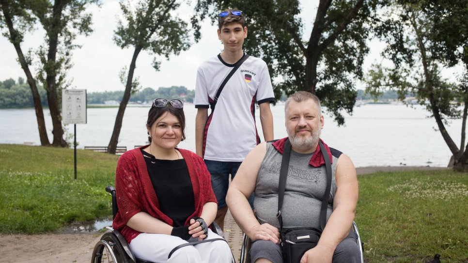 Tetiana Baransova, Nansen Refugee Award regional winner for Europe, with husband Oleksiy Soroka and son Pavlo, at Pavlo's birthday party in Natalka Park, Kyiv, Ukraine.