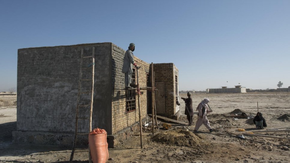 Construction work on a house in the Dand district of Kandahar province that was built with the support of UNHCR's Cash for Shelter project (3 February, 2020). 