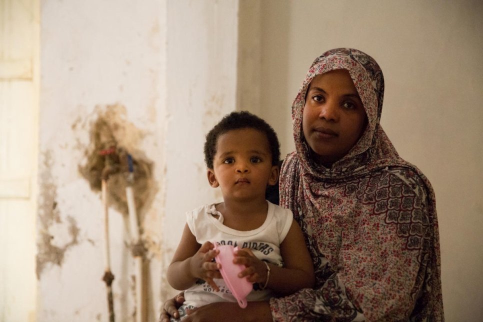 Libya. Sudanese caregiver hosts fellow refugees through UNHCR programme