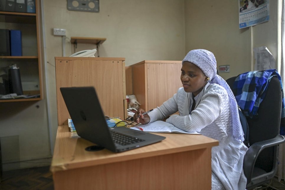 Stateless Shona woman, Nosizi Reuben, attends a virtual lecture at the Kenya Human Rights Commission office in Nairobi, Kenya.
