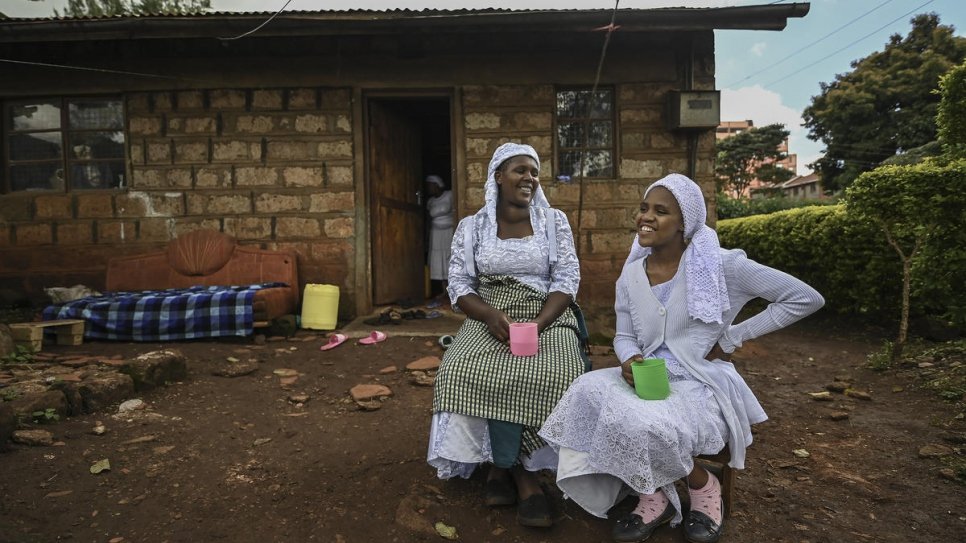 Twenty-year-old stateless Shona woman, Nosizi Reuben (right), talks to her mother Angeline outside their home  in Kinoo, Kenya.