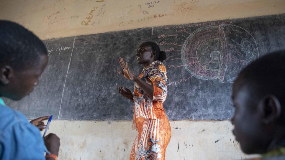 A secondary school teacher leads a science class in Makpandu settlement, South Sudan.
