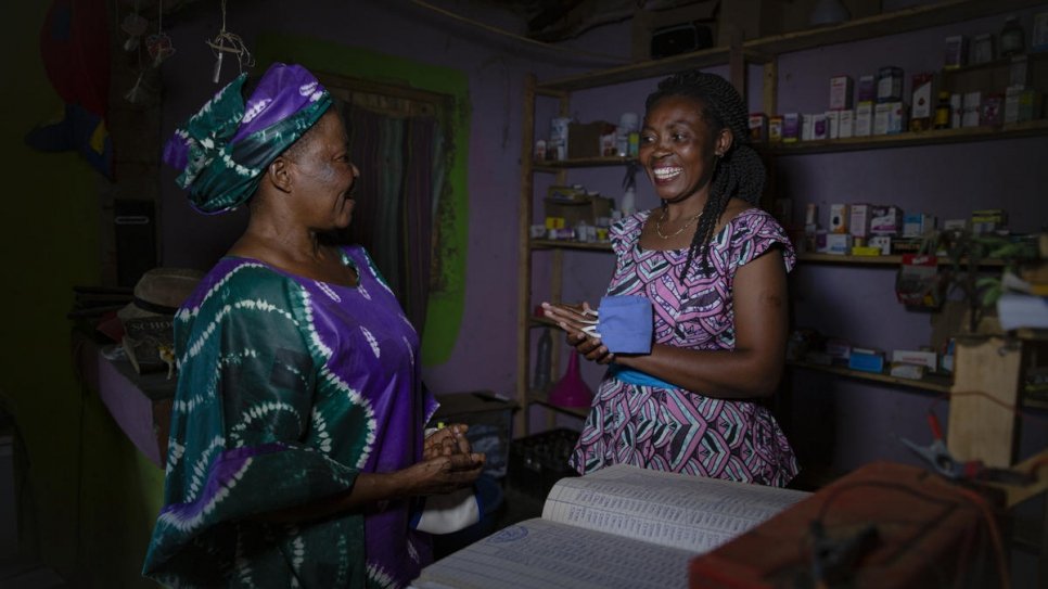 Congolese refugee, Furaha Ceru Olive (right), speaks with the Nansen Refugee Award regional winner for Africa, Francoise Sabuni Chikunda in Nakivale settlement, Uganda.