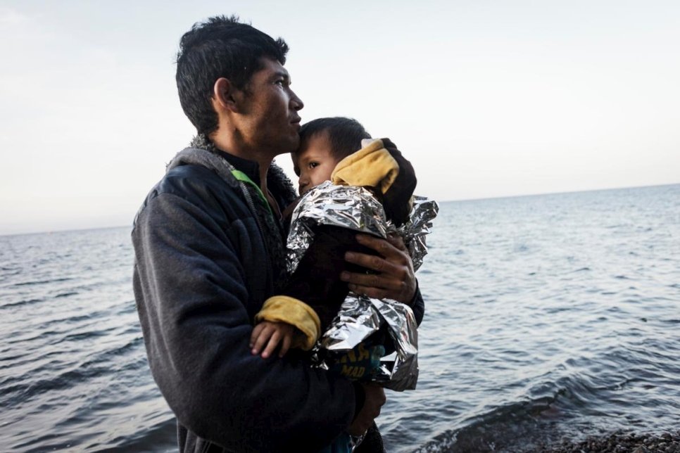 Greece. Refugees arrive on the shores of the island of Lesbos after crossing the Aegean sea from Turkey