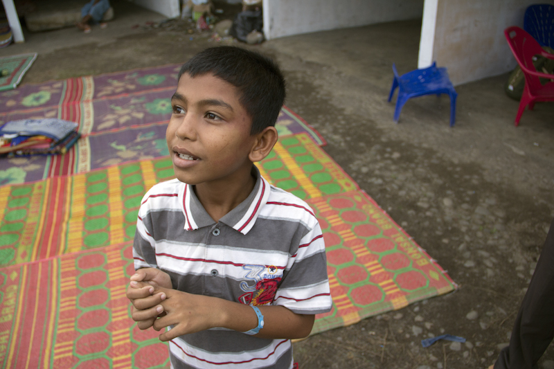 Yasin, from Myanmar, was orphaned in May when his parents drowned after jumping from a sinking smugglers' boat off Aceh, Indonesia.