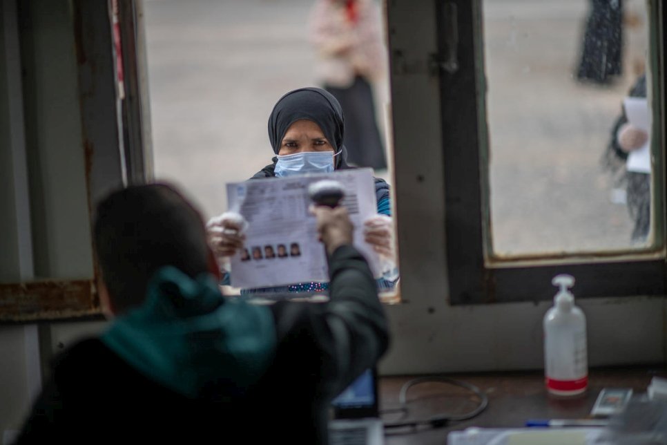 Jordan. UNHCR distributes winter cash assistance to refugees in Azraq camp