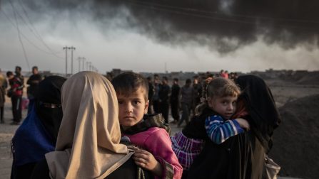 Iraqi IDP’s displaced by fighting in the village of Shora, 25km South of Mosul, reach an Iraqi army checkpoint on the Northern outskirts of Qayyarah. Qayyarah was liberated from ISIS over two months ago but is still engulfed in thick black smoke from oil wells set ablaze by the retreating militants. IDP's who reach Qayyarah are taken to Ja'dah IDP camp there. ; Around 3.3 million Iraqis, ten per cent of the population of Iraq, have fled their homes since fighting in several parts of the country intensified in March 2014. With a military operation to retake the city of Mosul beginning in October 2016, new camps have been quickly built by UN agencies in Iraq to accommodate some of the anticipated 1 million people likely to be displaced. Debaga camp, completed in late 2015 for an initial 3,000 people, quickly saw its population increase tenfold. The numbers are likely to continue rising.