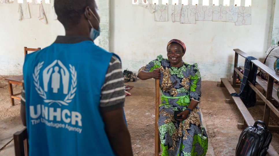 Sister Adolphine talks to John, a UNHCR staffer, at the reintegration centre in Kananga, where she trains women recovering from gender-based violence.