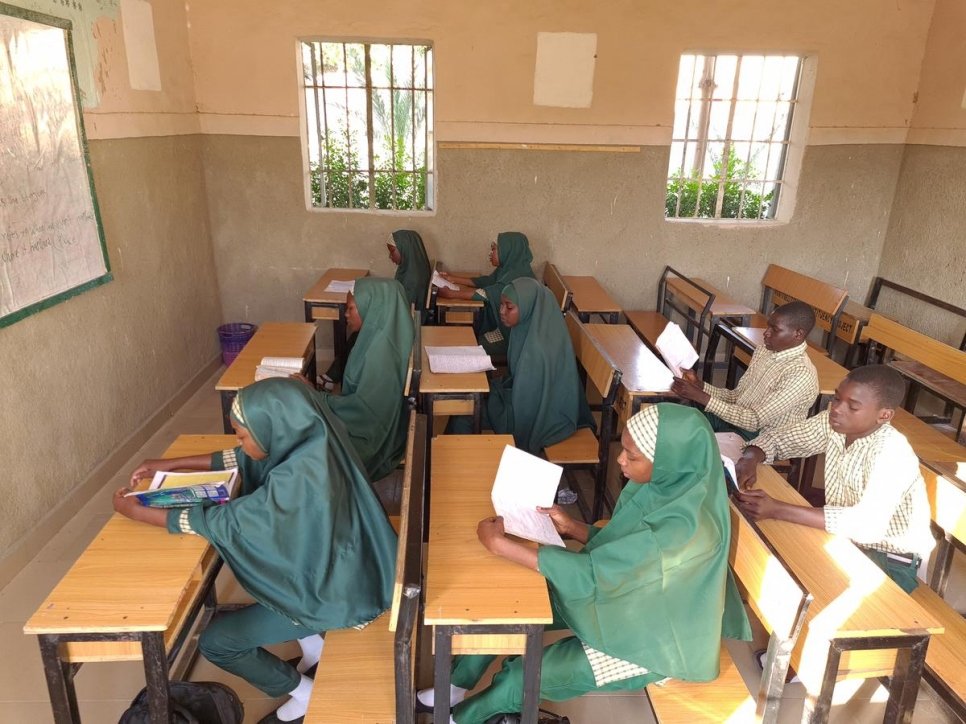 Displaced students attend a class at one of four schools established by Nansen Refugee Award Laureate, Zannah Mustapha, in Borno State, Nigeria.