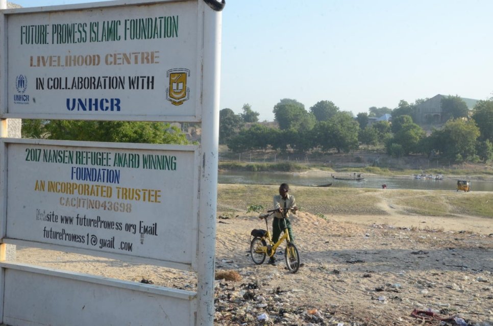 A sign indicates the site of one of four schools established by Nansen Refugee Award Laureate, Zannah Mustapha, in Borno State, Nigeria.