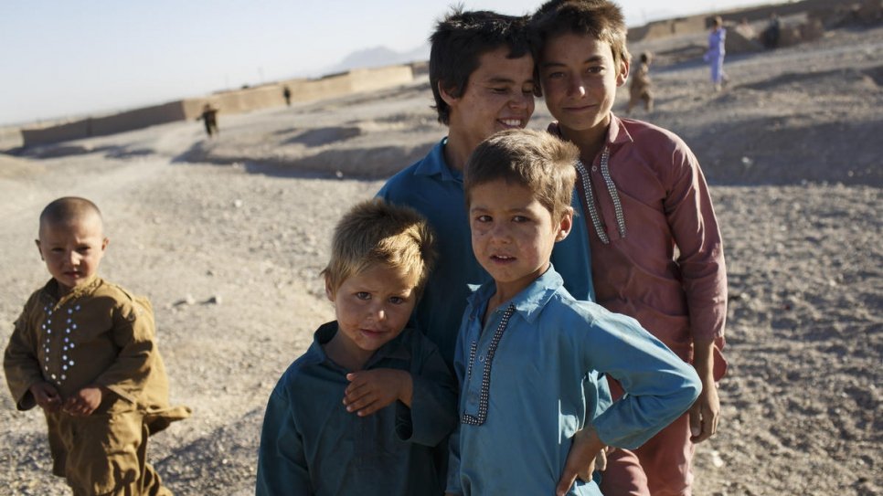 Children play at an informal settlement for internally displaced people on the outskirts of Herat City, Afghanistan.