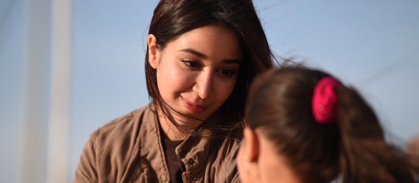 Assel Omran with a child, Za'atari Camp, Jordan