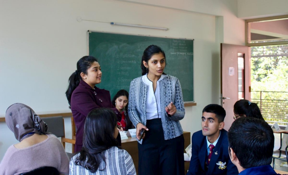 A New Delhi en Inde, des étudiants débattent sur les déplacements induits par le changement climatique dans le cadre du Défi 2020 MNU-réfugiés. Février 2020. 