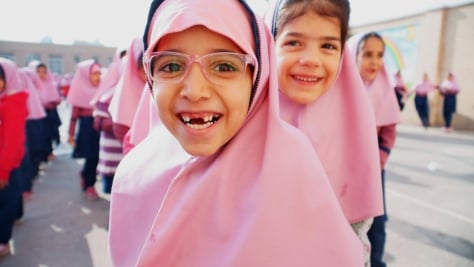 Iran. Afghan refugee sisters go to school for the first time