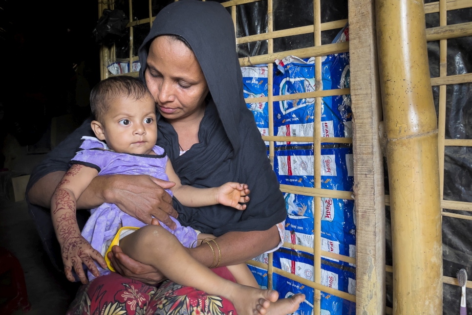 Bangladesh. Rohingya woman took shelter in her relative's home after losing everything in a recent fire at Kutupalong refugee settlement.