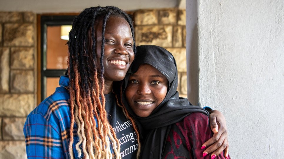 Raba, from Sudan, poses with new friend Adah Wilson, from South Sudan, at the United States International University - Africa.
