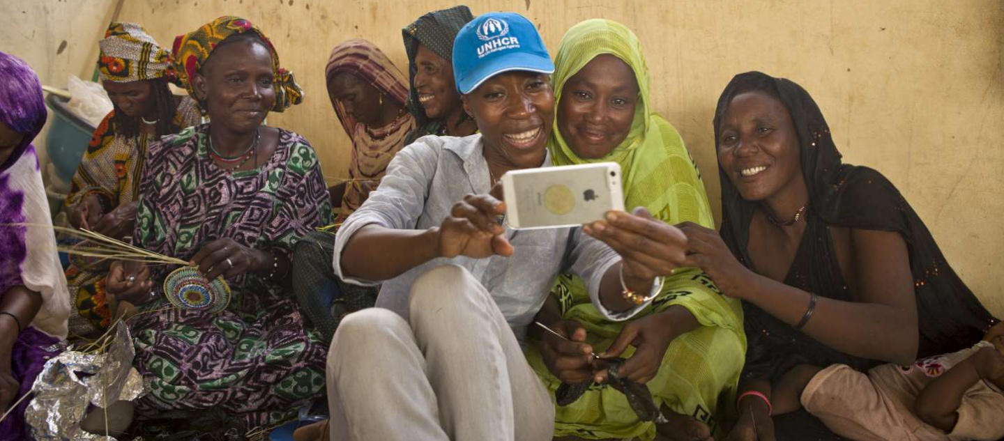 Burkina Faso / Rokia Traore / Rokia Traore shares a selfie she took with Malian refugee women in Goudoubo camp, Burkina Faso. The Malian singer visited the center where the women do handicraft, they told her about the violence they witnessed in northern Mali before finding refuge in Burkina Faso. Goudoubo camp hosts some 10,000 Malian refugees.It was Rokia's first trip with UNHCR.Burkina Faso hosts some 34,000 Malian refugees who fled the northern part of their country in 2012 following a violent conflict that erupted between Tuareg groups and the Government.UNHCR / H. Caux / June 19, 2014