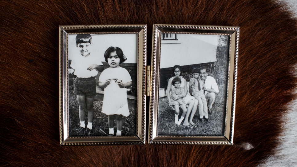 Naeem and Sameena (left) and the Merchant family (right) in Uganda. 