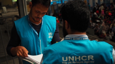 Educators play a game with children at a UNHCR-supported education centre in a high-risk area of Tegucigalpa, Honduras.