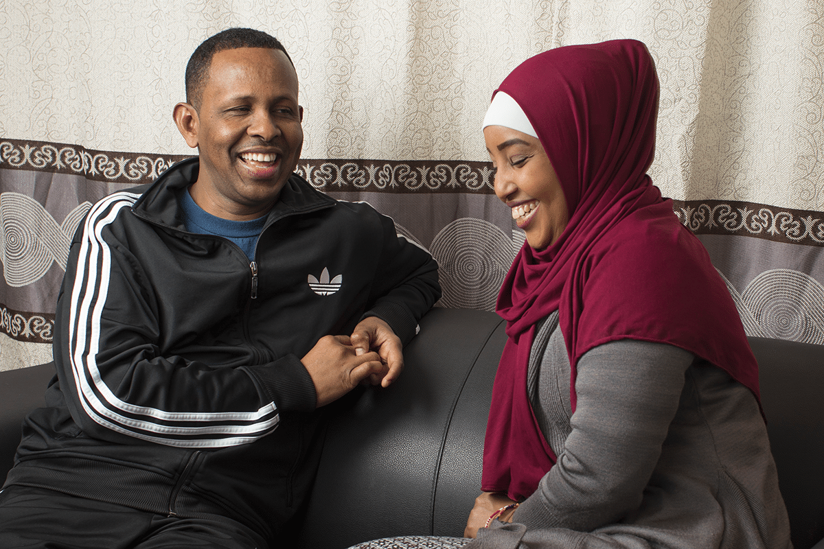 Iqra Ali Gaal sits with her uncle Ali Wasuge as they have their portrait taken in her apartment, in Hamilton, Canada.