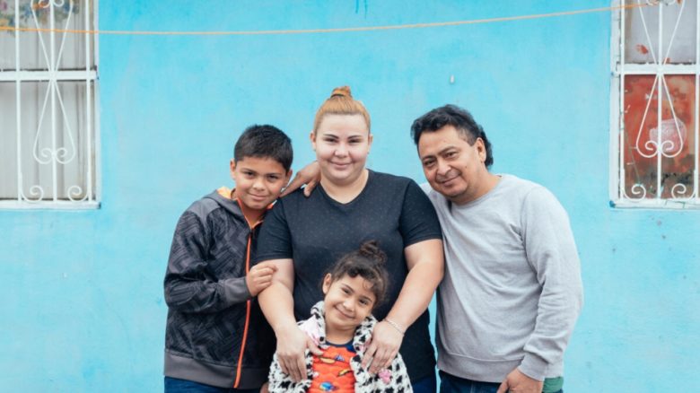 family looking at camera