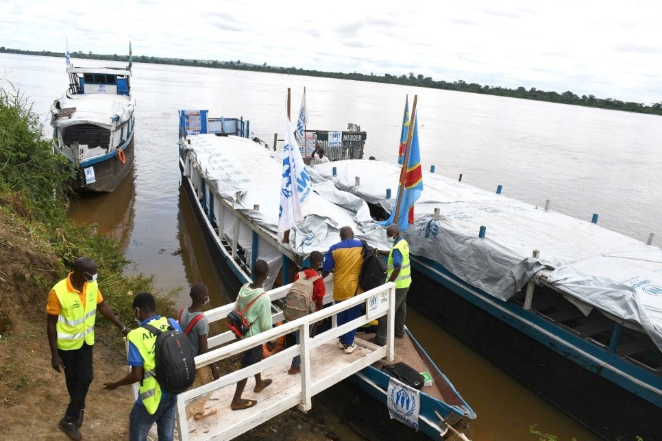 Refugees boarding boat