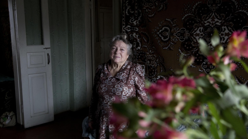 Vera lives alone in the home she bought with her husband in 1969. He died 5 years ago. He was the love of her life and she has happy memories of their life together in the house with their sons. When her house was shelled during fighting in 2014, she had an extremely lucky escape as her bedroom was completely destroyed moments after she got up from bed. She is extremely grateful to UNHCR for repairing her home – she couldn't imagine what she would have done otherwise. When she saw the damage the shelling caused she cried for a long time. But to be able to live here again is one of the happiest times in her life – this home means everything to her.