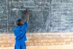 Rwanda. Primary school students in Mugombwa refugee camp, return to the classroom after extensive school closures due to COVID-19.