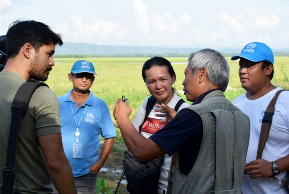 In this file photo taken November 2017, UNHCR High Profile Supporter Atom Araullo (left) joins UNHCR humanitarian workers to document the rapid influx of Rohingya refugees trying to enter the Bangladesh border after escaping violence in Myanmar.