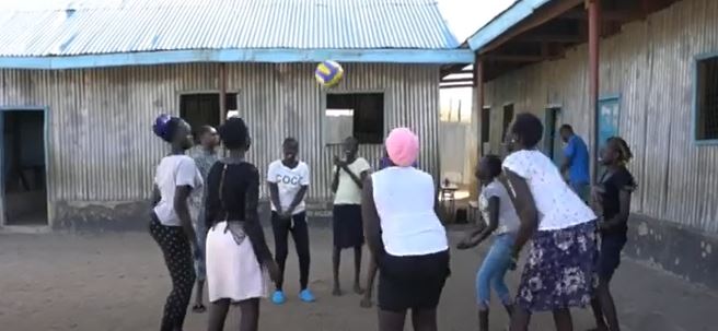 Kids playing sports.