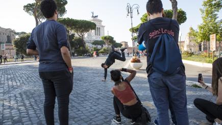 Adolescents having fun in the street.