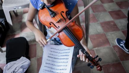 A girl plays the violin