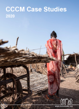 Photo of woman in South Sudan, walking in the camp