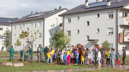 People outside of a housing unit.