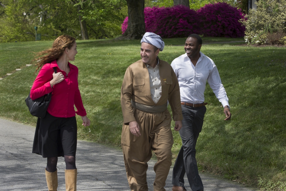 Miranda Kaiser with Refugee Center Online Board Members Naser Yahya and Mohy Omer