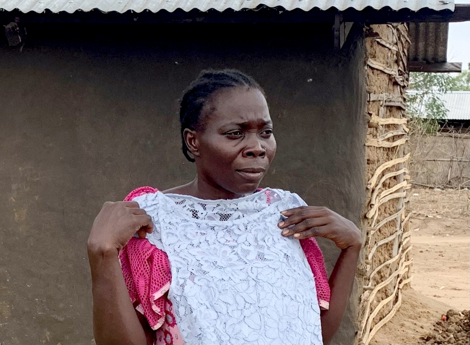 South Sudan. Clementina and her family receive new clothes